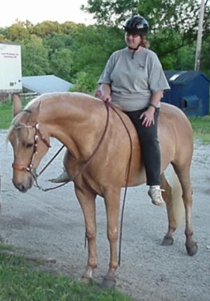 Tammy with her beloved Sunnie out for a summer ride.